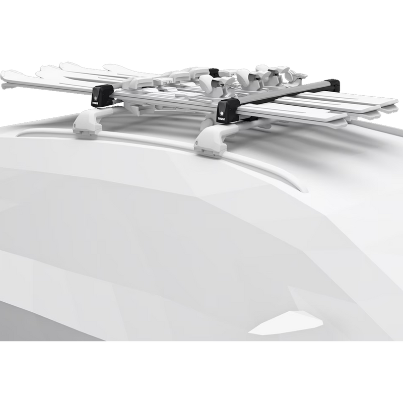Thule SnowPack 7326 L on car with skis