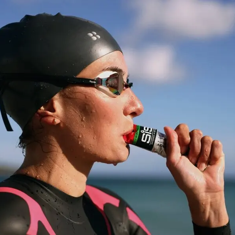 Go Energy + Electrolyte Gel, Science in Sport Go Energy + Electrolyte Gel in swimmers hand