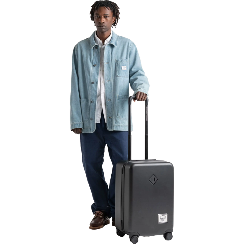 Heritage Hardshell Large Carry On Luggage, Heritage Hardshell Large Carry On with person