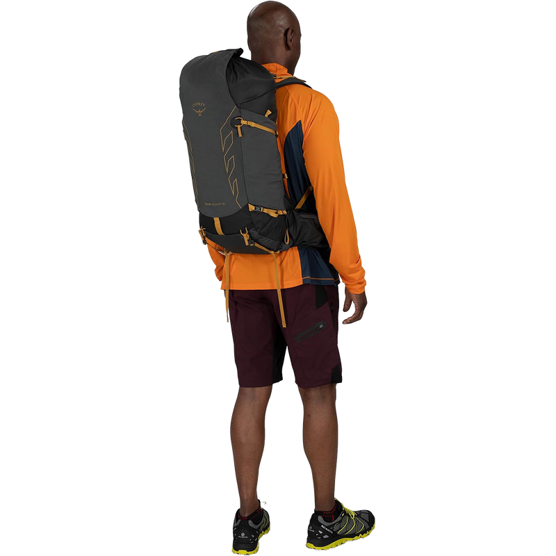 Talon Velocity 30, Osprey Talon Velocity 30 in Dark Charcoal/Tumbleweed Yellow on model back