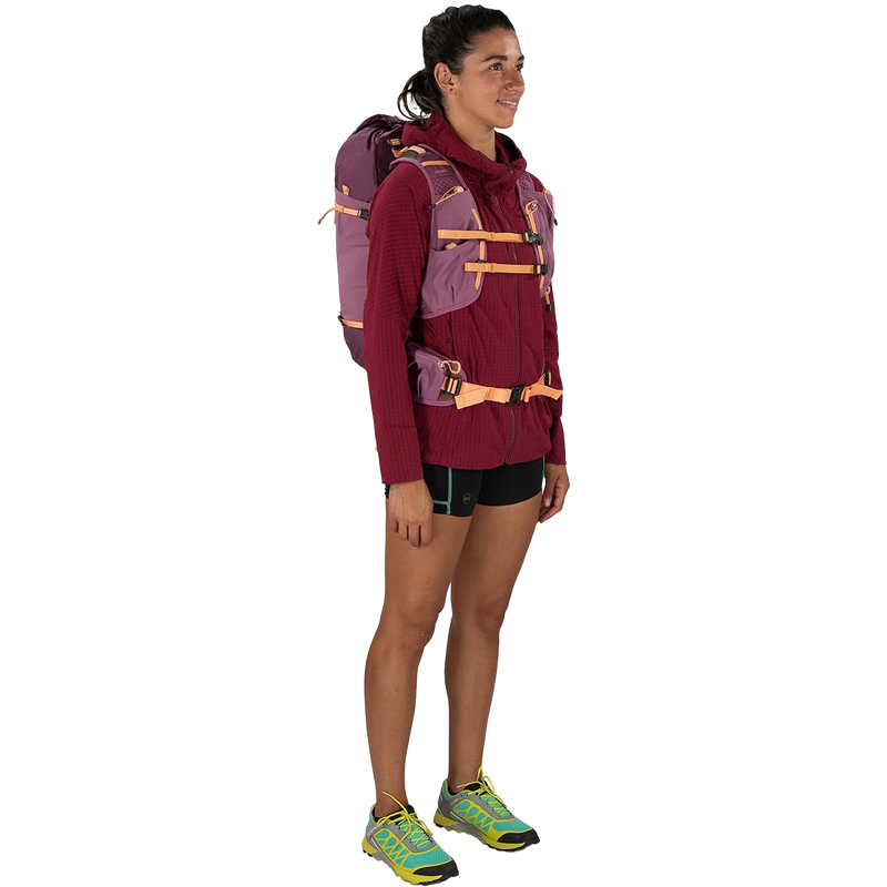 Women's Tempest Velocity 20, Osprey Tempest Velocity 20 in Pashmina/Melon on model front right
