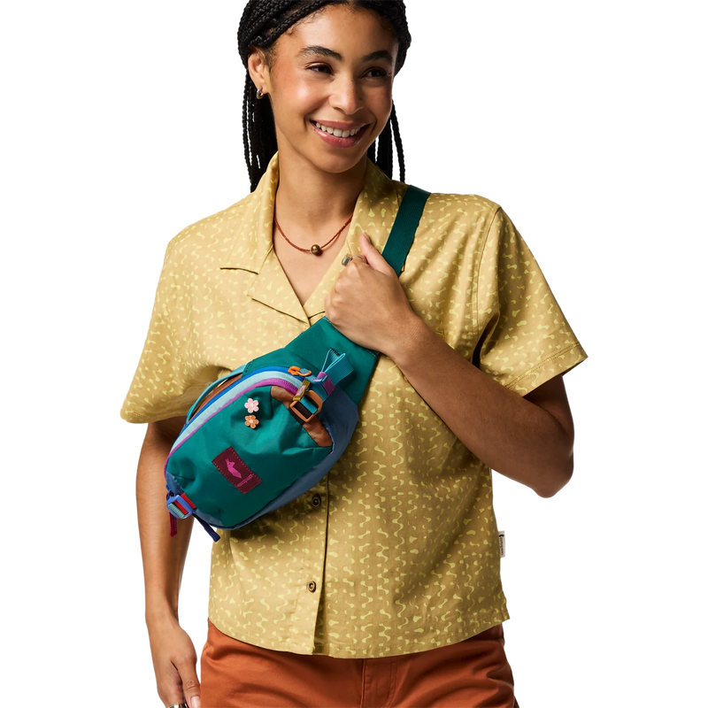 Allpa X 1.5L Hip Pack, Cotopaxi Allpa X 1.5L Hip Pack in Del Dia with model on shoulder