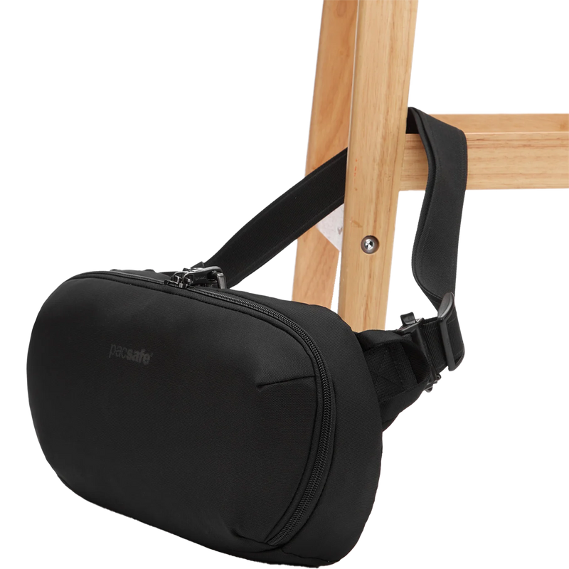 X Urban Sling, Pacsafe X Urban Sling in Black on chair
