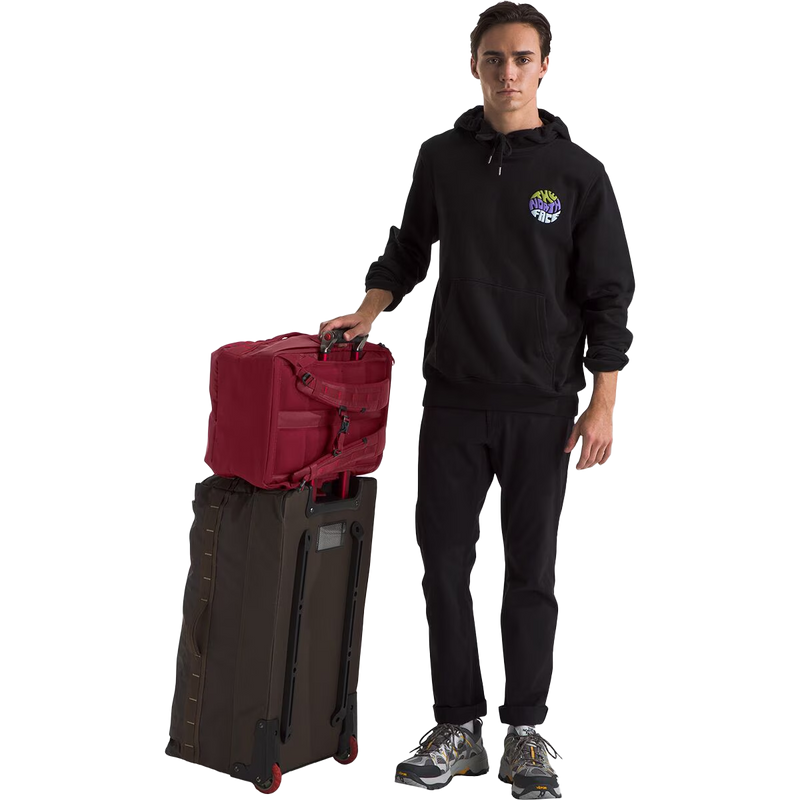 Base Camp Voyager Daypack, The North Face Base Camp Voyager Daypack in Beetroot TNF Red with model