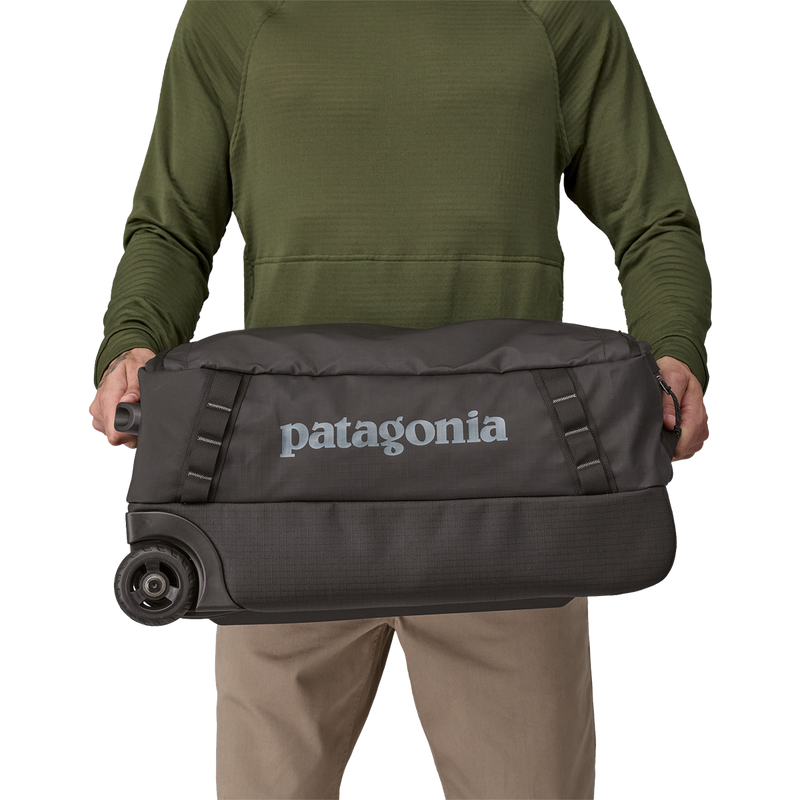 patagonia duffel forge grey roller Black Hole Wheeled 100L Feather Craft Fly Fishing the Black Hole Wheeled Duffel will protect your gear from rain and rough handling and still hold everything you need for a wayward journey Patagonia Black Hole MLC Wheelie