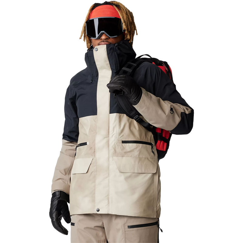 Men's First Tracks Jacket, Mountain Hardwear Men's First Tracks Jacket in Badlands Dunes Black on model front with backpack
