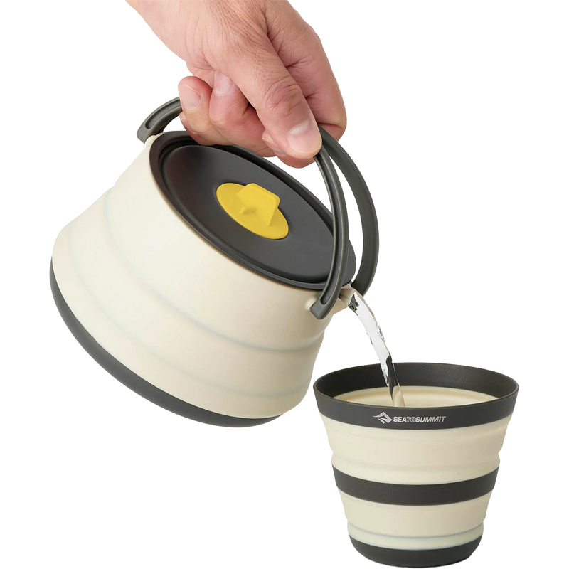 Frontier Ultralight Collapsible Kettle 1.1 L, Sea to Summit Frontier Ultralight Collapsible Kettle 1.3 L in Bone White pouring
