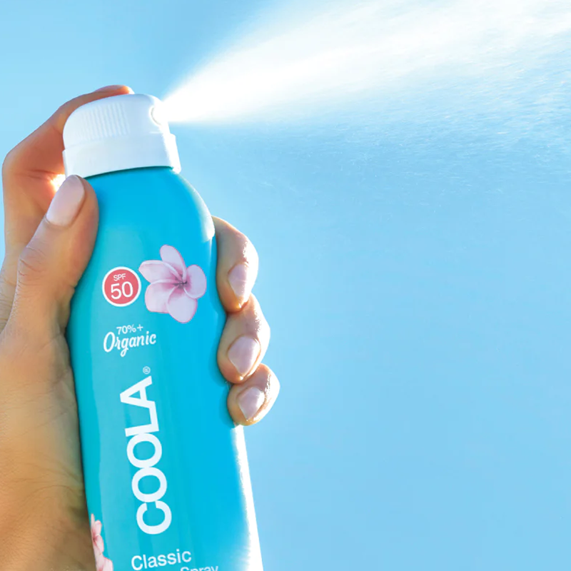 Classic Body Organic Sunscreen Spray SPF 50, COOLA Classic Body Organic Sunscreen Spray SPF 50 spraying
