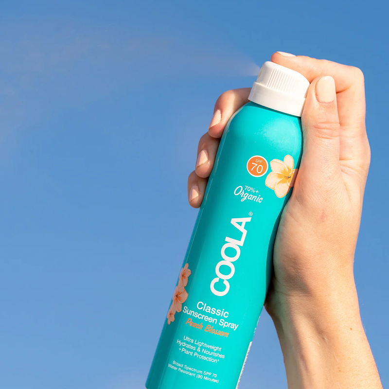 Classic Body Organic Sunscreen Spray SPF 70, COOLA Classic Body Organic Sunscreen Spray SPF 70 spraying