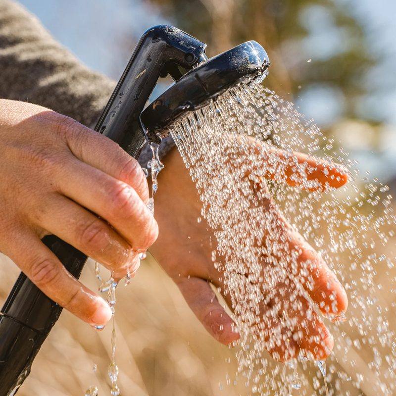 Portable Shower, Coghlan's Portable Shower in hand