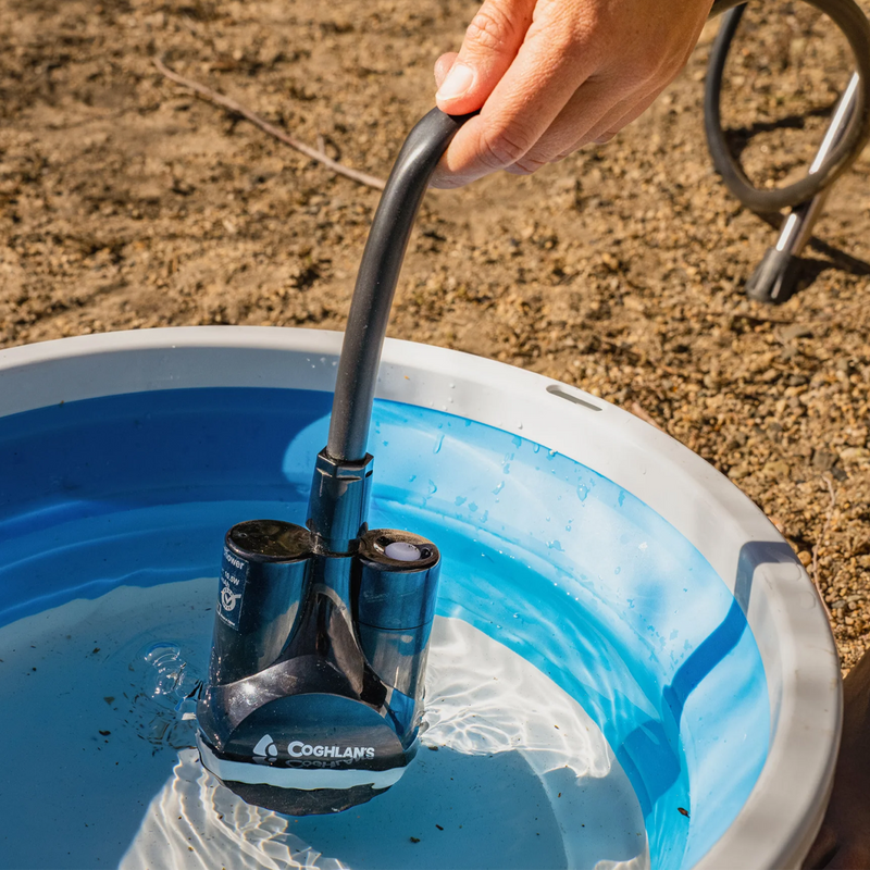 Portable Shower, Coghlan's Portable Shower pump base in water
