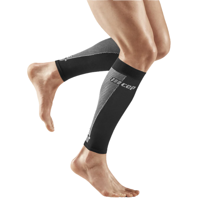 Men's UltraLight Compression Calf Sleeves, CEP Compression Men's UltraLight Compression Calf Sleeves in Black/Light Grey on model right