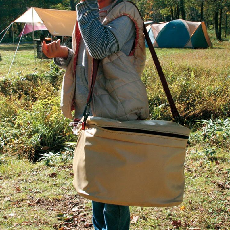 Snow Peak Soft Cooler 18 over shoulder
