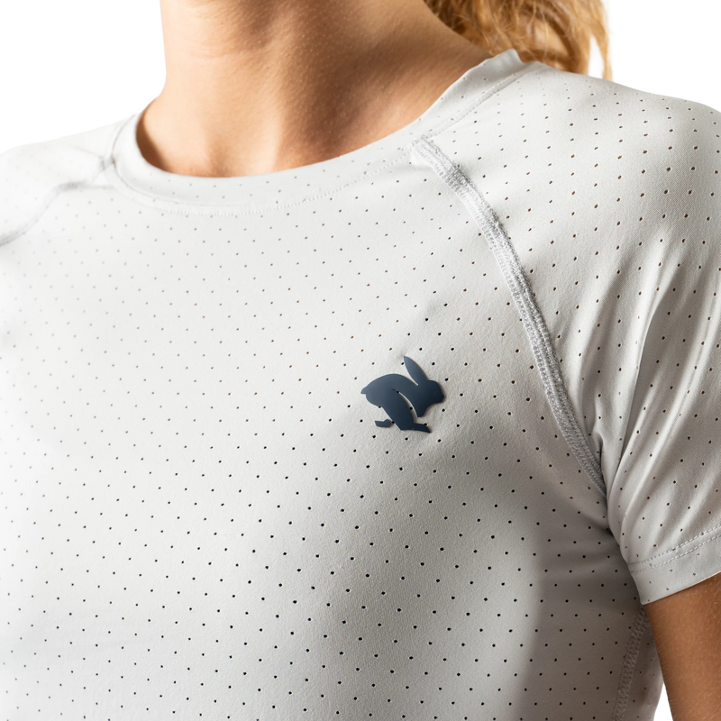 Women's Ice Perf Tee Short Sleeve, Rabbit Women's Ice Perf Tee Short Sleeve in 057 Quiet Grey front left logo