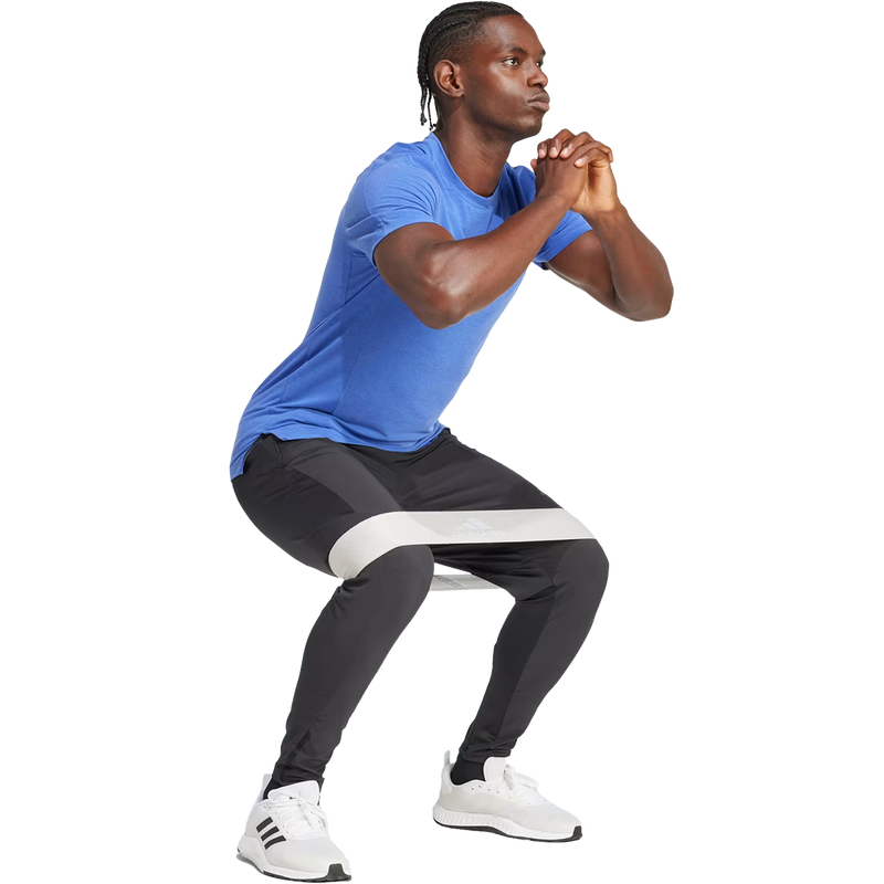 Men's D4T Hybrid Pant, Adidas Men's D4T Hybrid Pant in black on model action