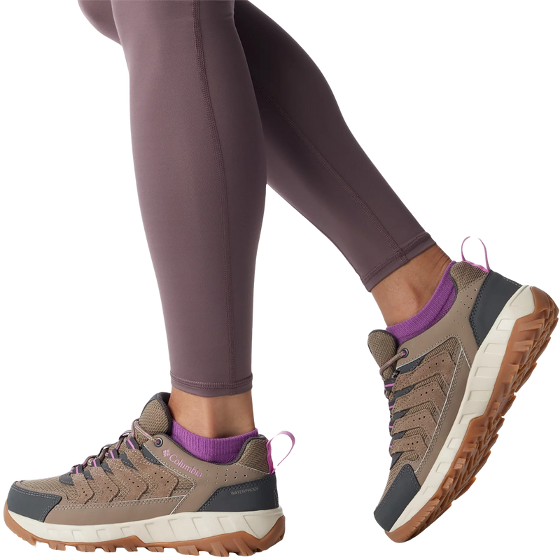 Women's Strata Trail Low WP Wide, Columbia Women's Strata Trail Low WP Wide in 252-Wet Sand on model