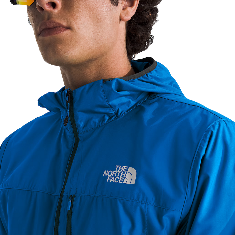 The North Face Higher Run Wind Jacket in Hero Blue Front Logo