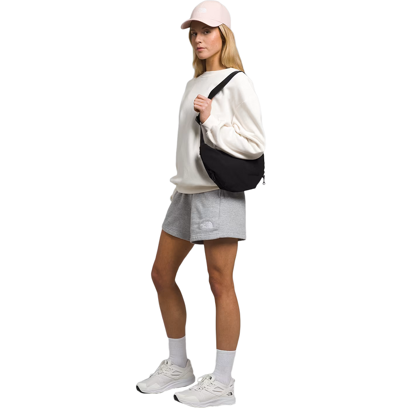 Women's Never Stop Crossbody, The North Face Women's Never Stop Crossbody in 4H0-TNF Black with model