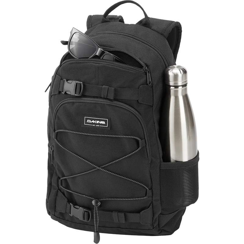 Youth Grom 13L, DaKine Youth Grom 13L in Black with water bottle and pocket unzipped