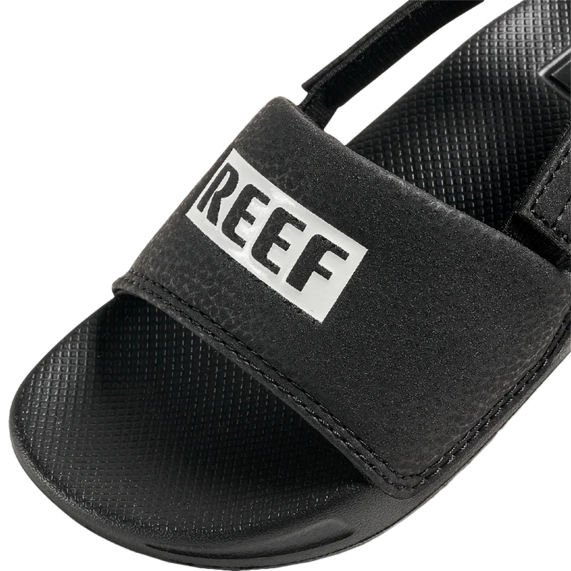 Youth Little One Slide, Reef Youth Little One Slide in Reef Black/White left toe strap