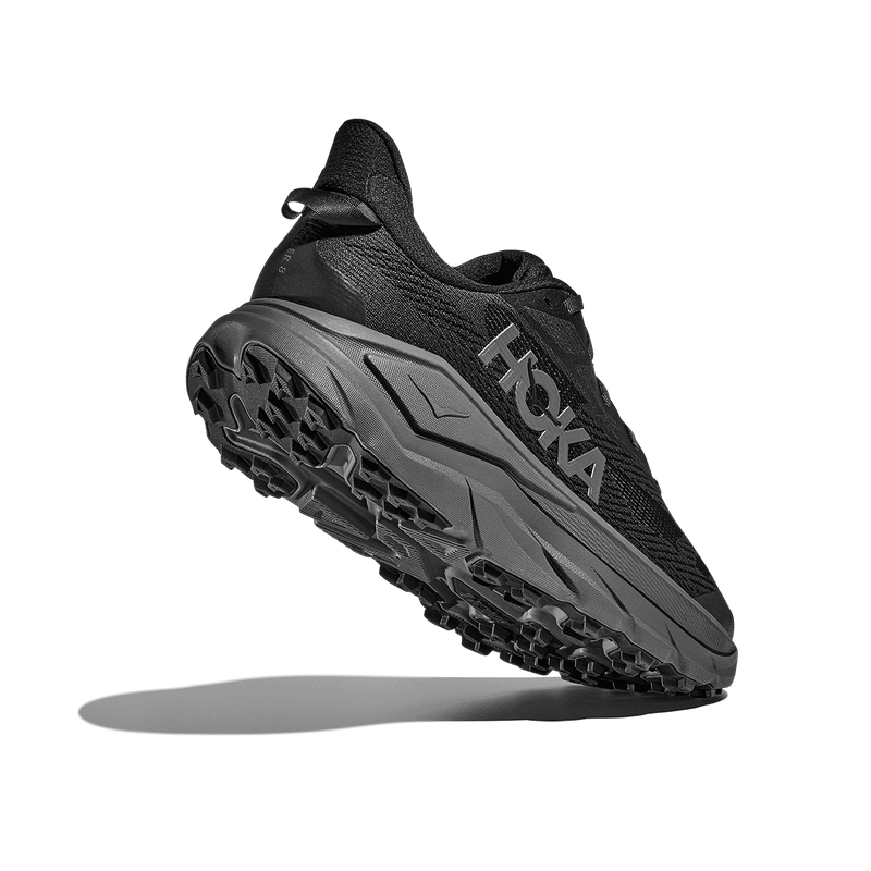 Men's Challenger 8 Wide, Hoka Men's Challenger 8 in Black - angled view showing lugs on sole