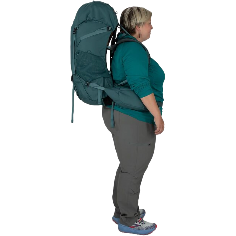 Women's Renn 65L EF, Osprey Renn 65L EF in Cascade Blue/Melon Orange on model right side