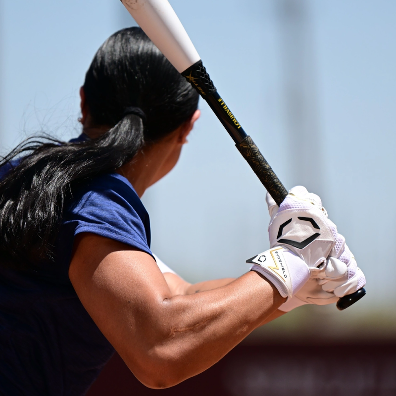 Youth Carbyne Batting Glove with Wrist Wrap, EvoShield Carbyne Batting Glove with Wrist Wrap holding bat