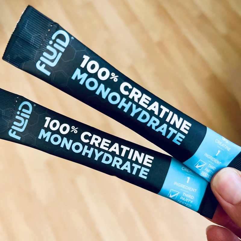 100% Creatine Monohydrate (30 Single Servings), Fluid 100% Creatine Monohydrate single packet in hand