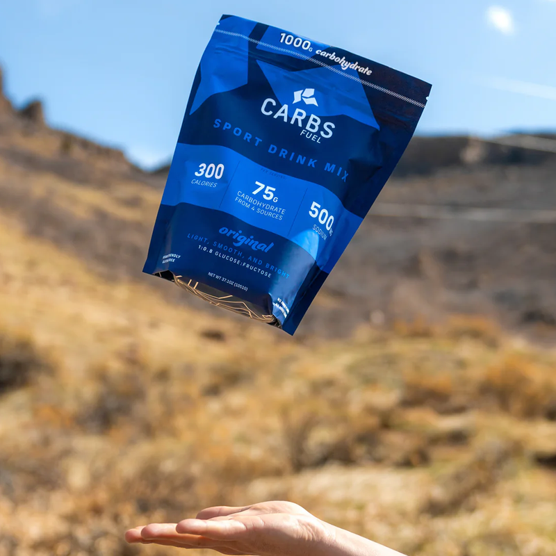 Original 1000g Sport Drink Mix Resealable Bag, Carbs Fuel Original 1000g Sport Drink Mix Resealable Bag in hand