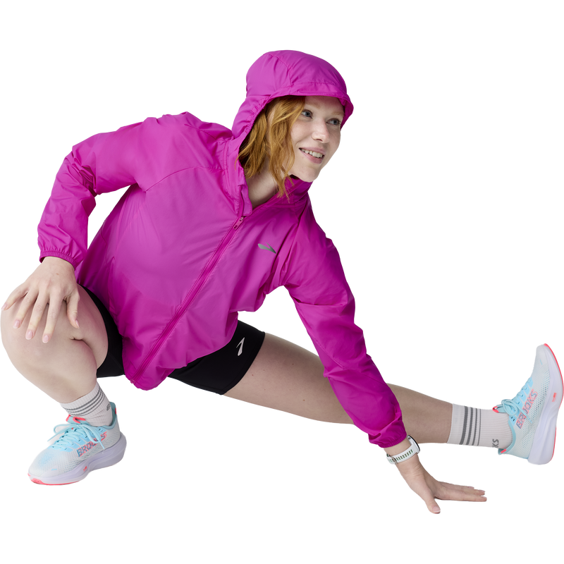 Women's Canopy Packable Jacket, Brooks Women's Canopy Packable Jacket in 588-Magenta action