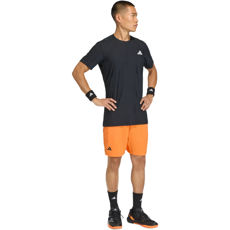Men's FreeLift Tee, Adidas Men's FreeLift Tee in Black full body view on model