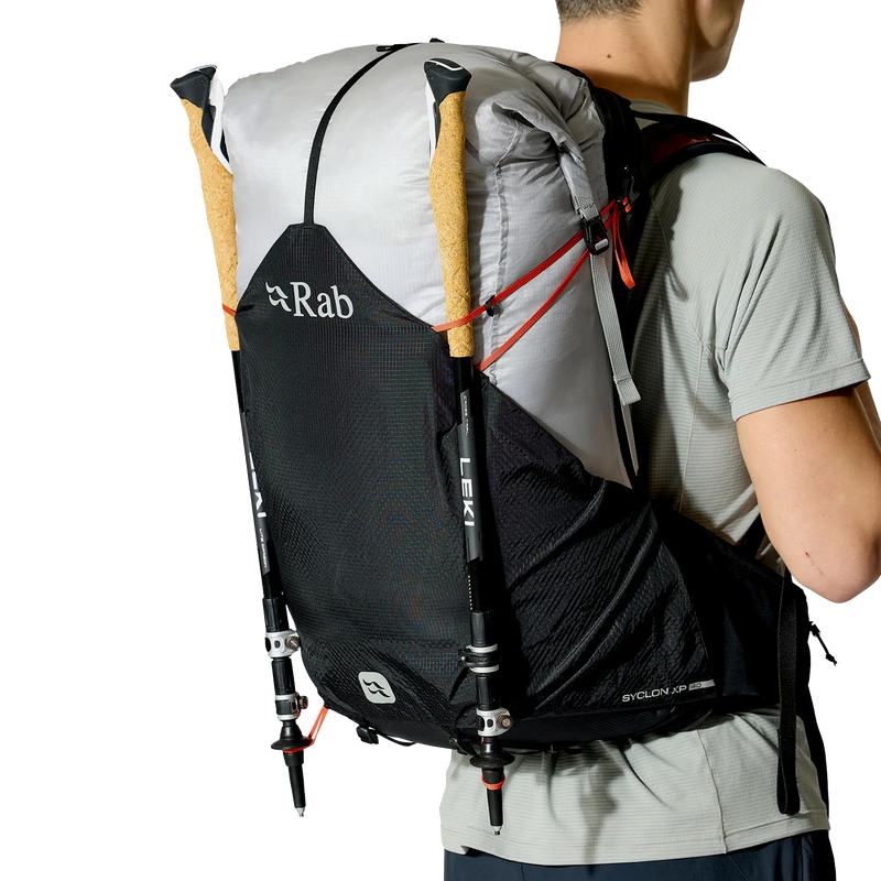 Syclon XP 40, Rab Syclon XP 40 in BDP-Black/Dark Pewter on model right with trekking poles