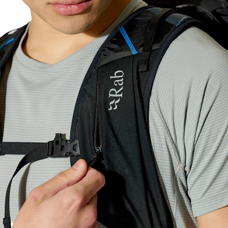 Syclon XP 30, Rab Syclon XP 30 in Black/Maya Blue left harness strap zipper pocket