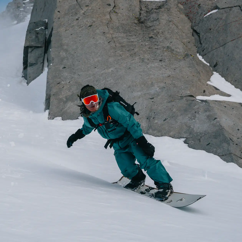 Men's Shralpinist Stretch Recycled Jacket, Jones Snowboards Men's Shralpinist Stretch Recycled Jacket in Atlantic Blue on model snowboarding