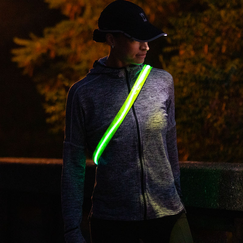 Optic Beam 360 Rechargeable Belt, Amphipod Optic Beam™ 360 Belt as sash on female runner