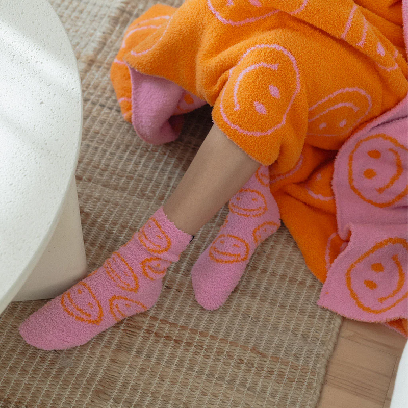 Smiley Local Beach Cozy Socks, Local Beach Smiley Local Beach Cozy Socks on model
