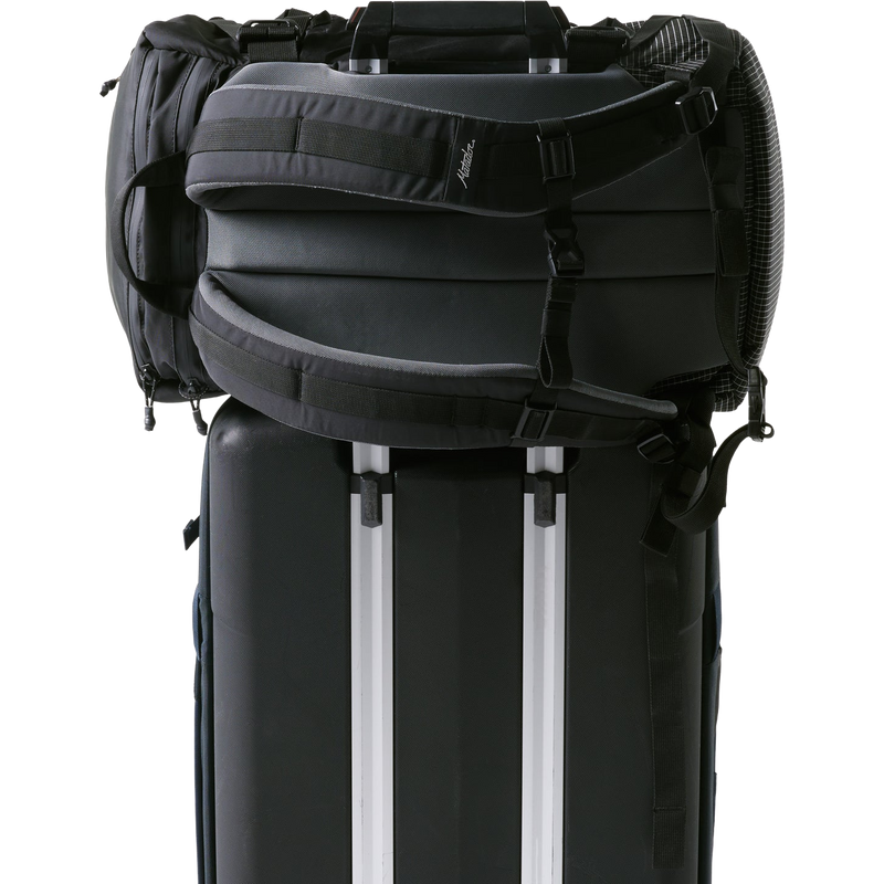 SEG28 Travel Pack, Matador SEG28 Travel Pack in Black with suitcase