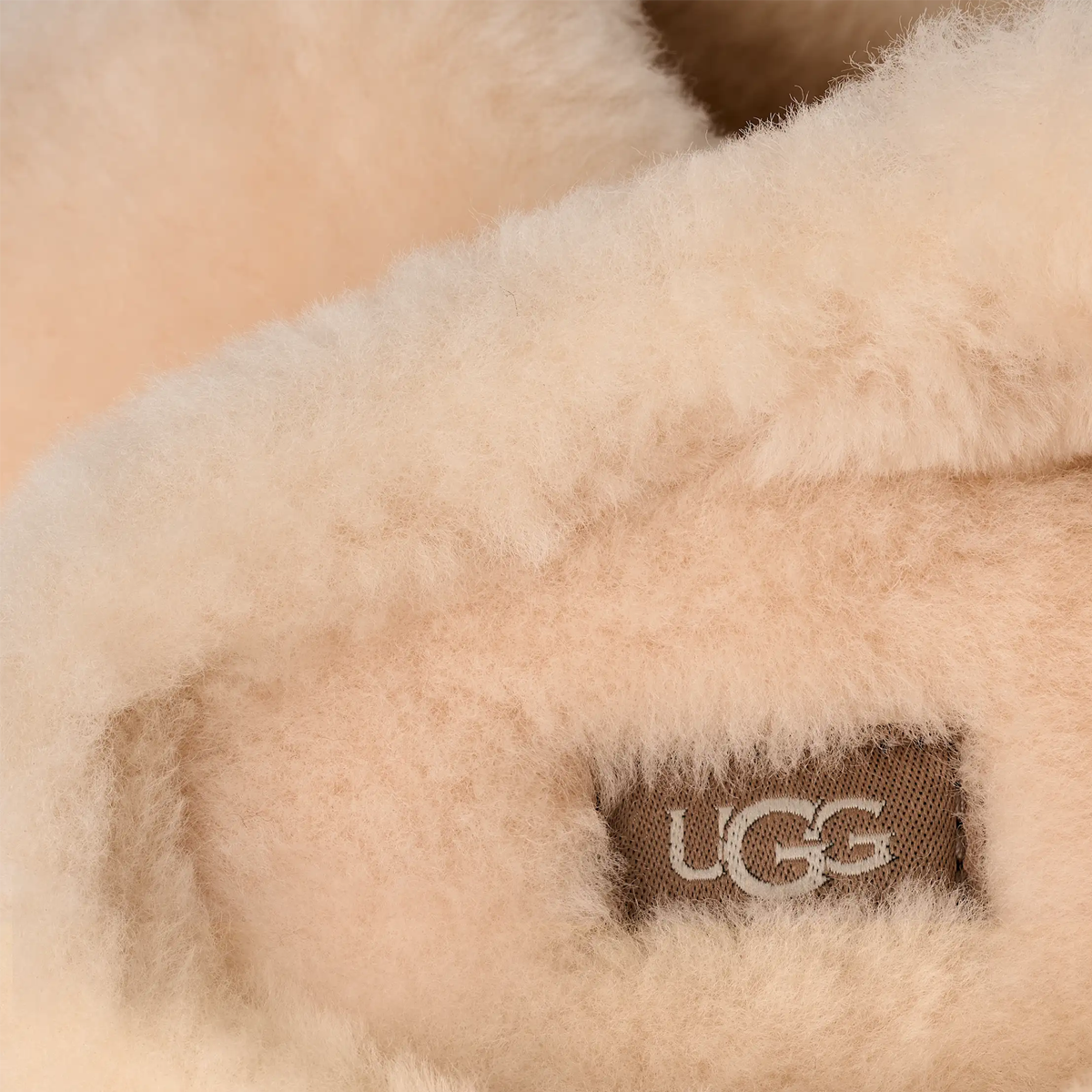 UGG Women's Elea Fluffed Slip-On in Natural with inside sole detail