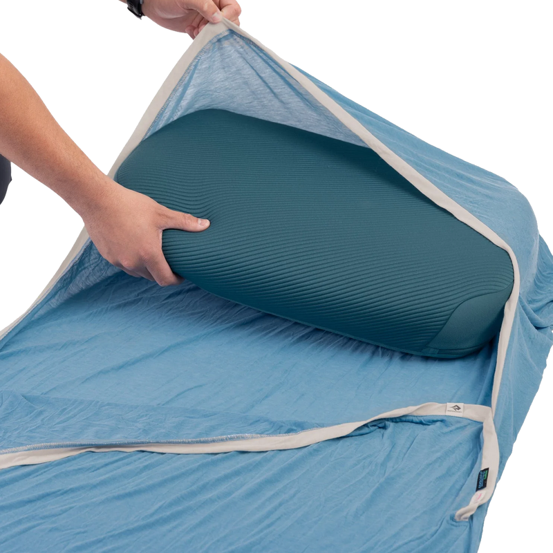 Breeze Lightweight Rectangular Liner with Pillow Sleeve, Sea to Summit Breeze Lightweight Rectangular Liner with pillow being placed in Pillow Sleeve
