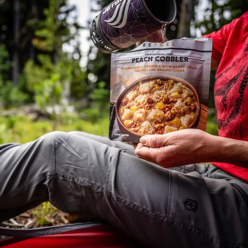 Peach Cobbler (2 Servings), Peak Refuel Peach Cobbler (2 Servings) in hand