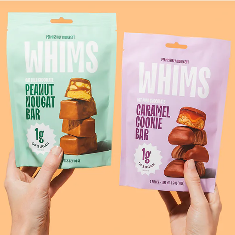 Oat Milk Chocolate Pouch, Whims Oat Milk Chocolate Pouch bags in hands