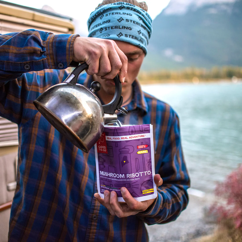 Essential 5-Day Emergency Food Kit, Good To-Go Essential 5-Day Emergency Food Kit Mushroom Risotto in hand