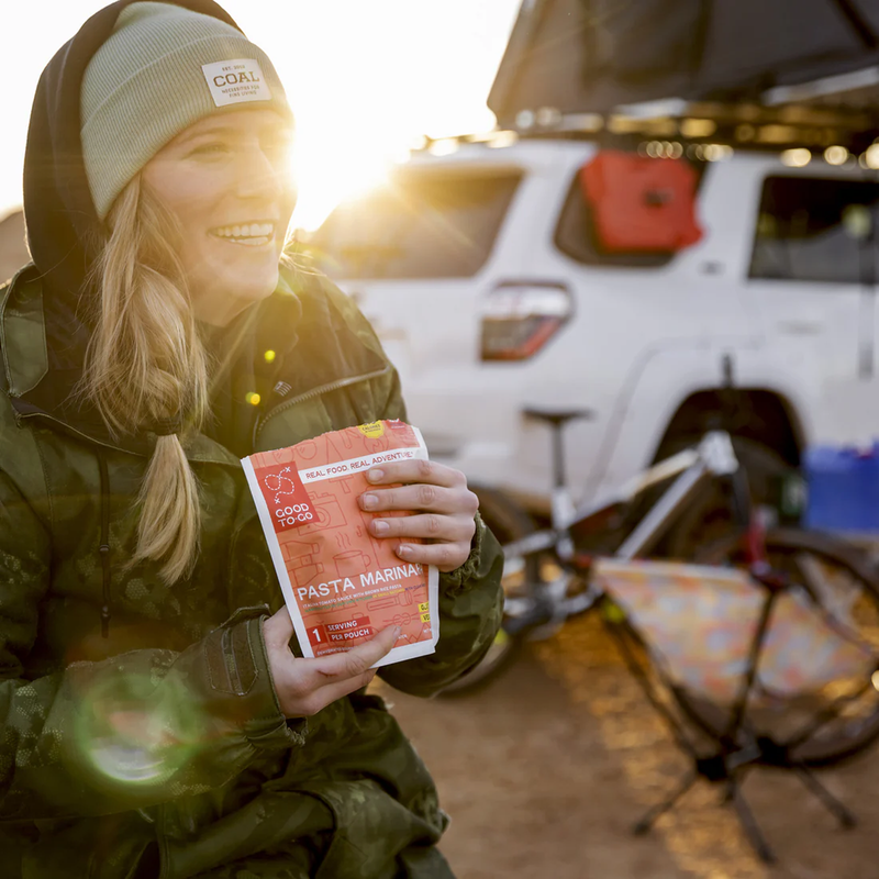 Vegan 5-Day Emergency Food Kit, Good To-Go Vegan 5-Day Emergency Food Kit Pasta Marinara in hand