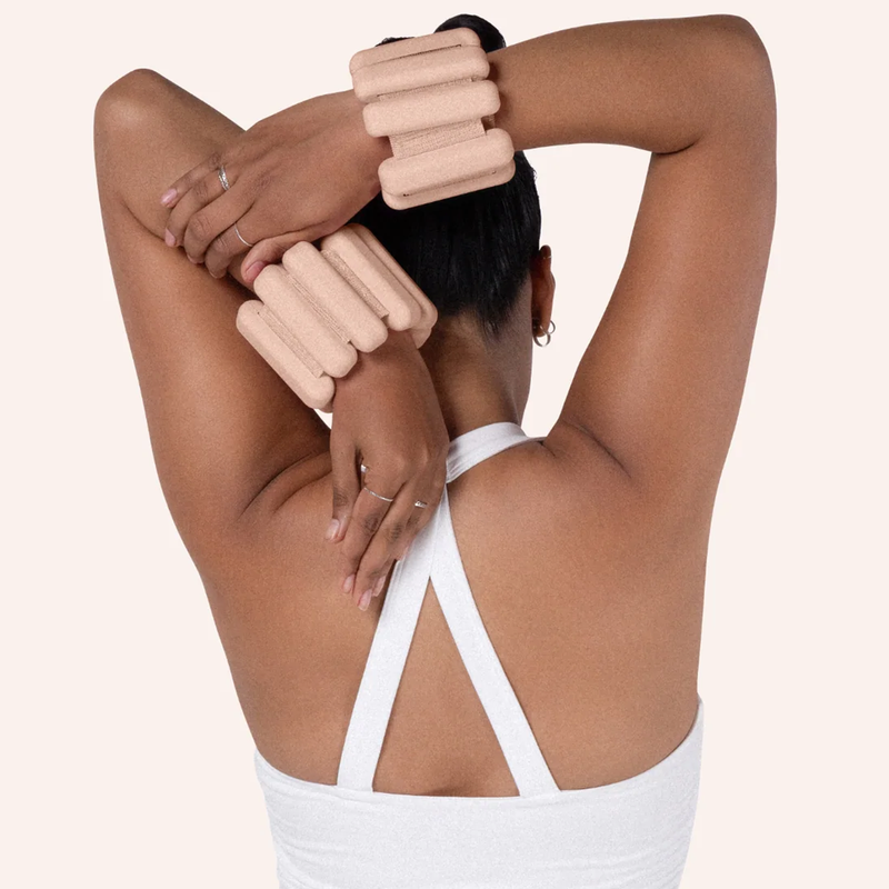 Bala Bangles 2 lb, Bala Bala Bangles 2 lb on wrists during stretch