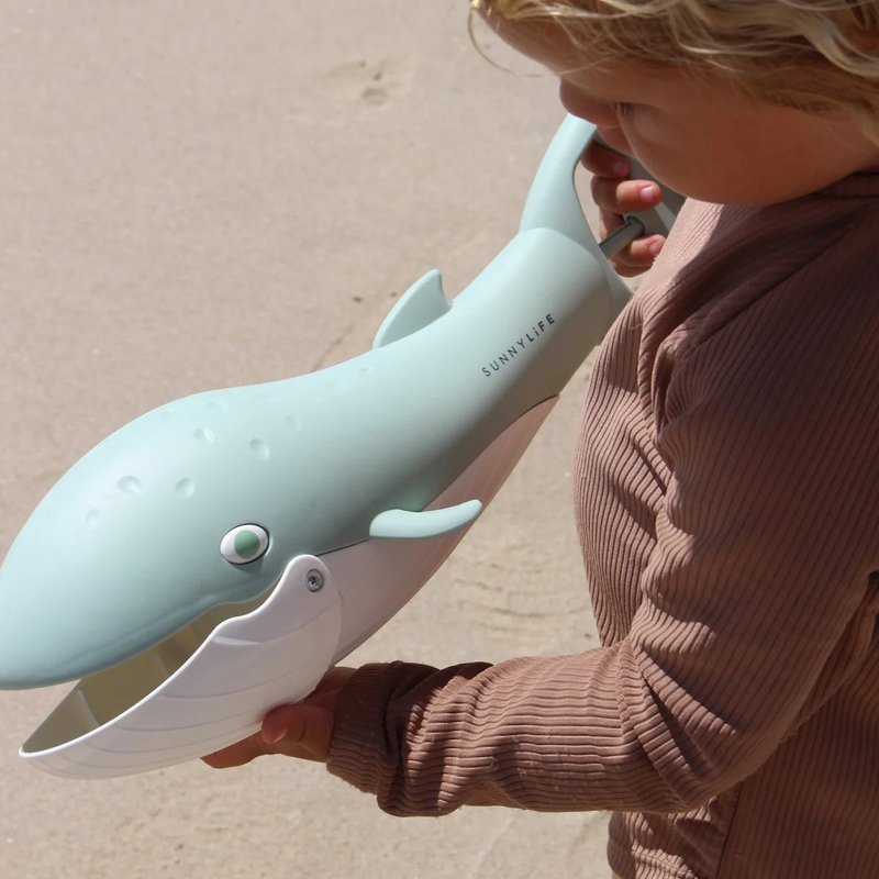 Sand Claws Whale, Sunnylife Sand Claws Whale in Green with model on beach