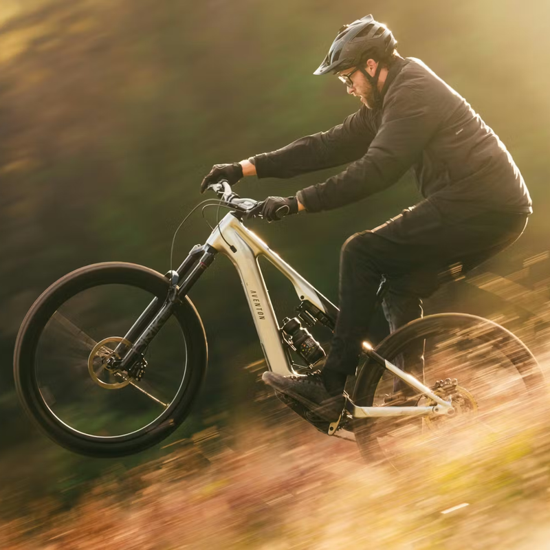 Current EXP, Aventon Current EXP in Glacier Mint with model on trail