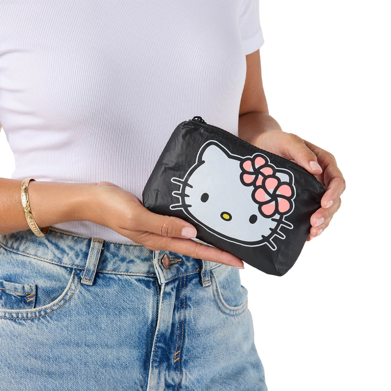 Aloha Collection Gone Bananas Kitty Mini Pouch hello kitty facing side with model