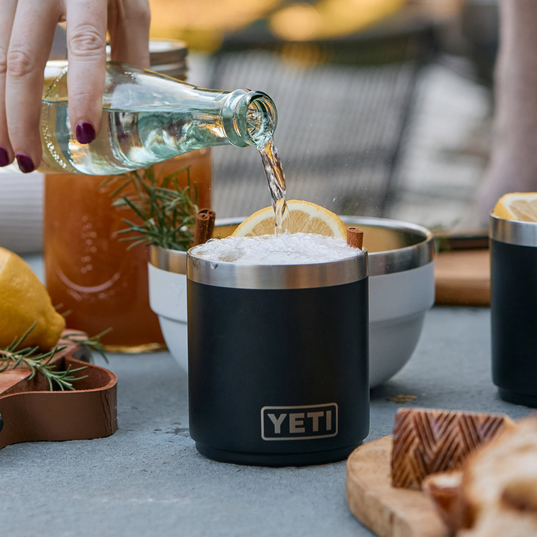 Yeti Rambler 10 oz Ceramic Lined Lowball 2.0 Lifestyle drink pouring