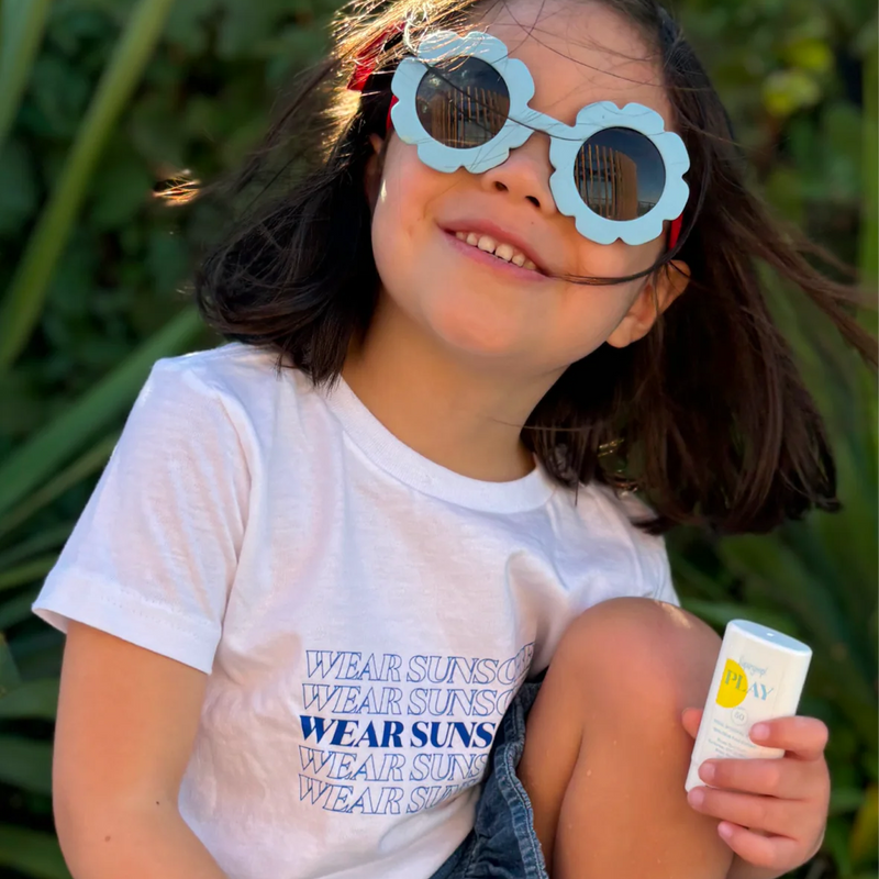 PLAY 100% Mineral Stick SPF 50, Supergoop PLAY 100% Mineral Stick SPF 50 in kids hand