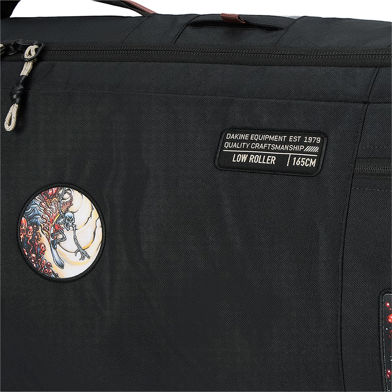 DaKine Low Roller Snowboard Bag X Mayhem in Mayhem Marron with logo and artwork patch details